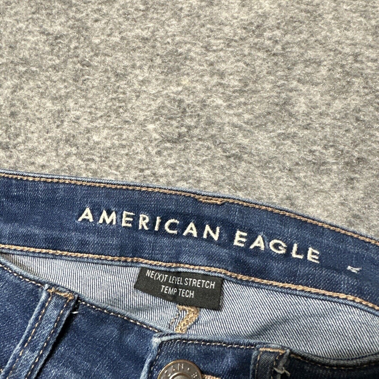 American Eagle Distressed Stretch Temp Tech Hi Rise Jegging Women's 4R Blue