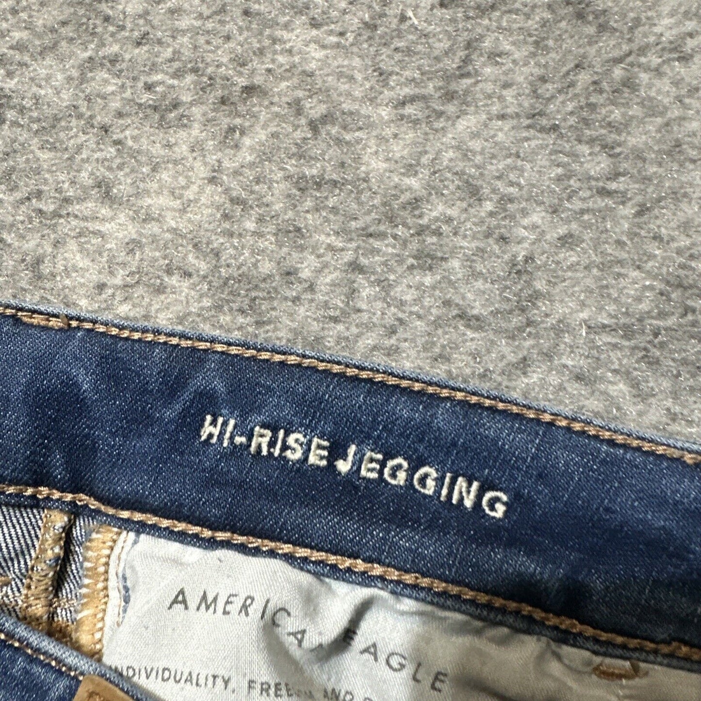 American Eagle Distressed Stretch Temp Tech Hi Rise Jegging Women's 4R Blue