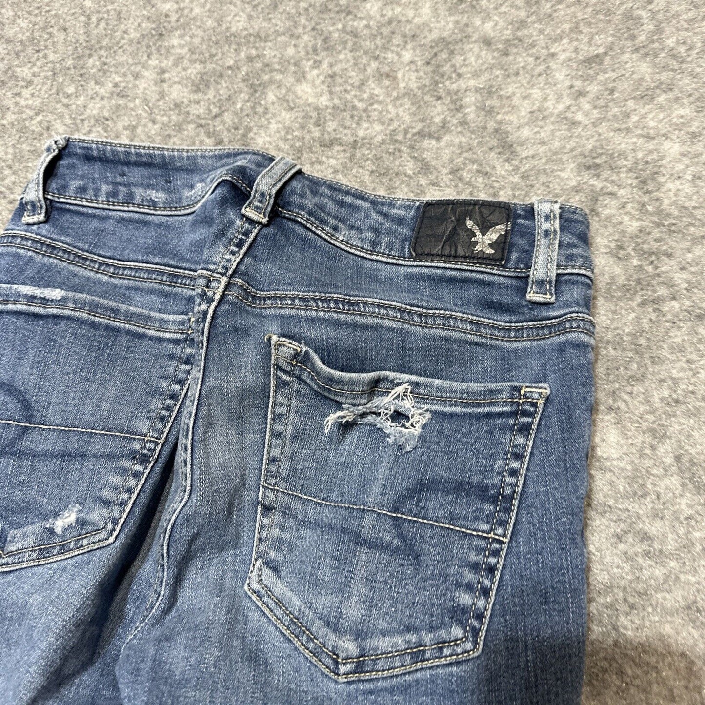 American Eagle Super Stretch Women's Distressed Hi Rise Jegging Size 0 Blue