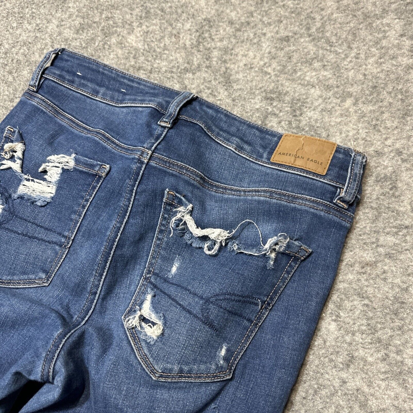 American Eagle Distressed Stretch Temp Tech Hi Rise Jegging Women's 4R Blue
